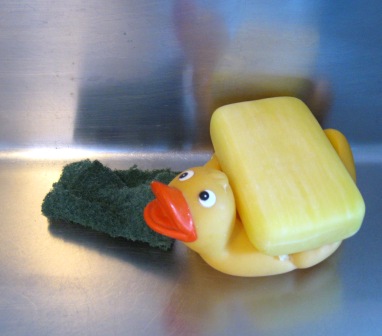 Duck soap holder and scouring pad